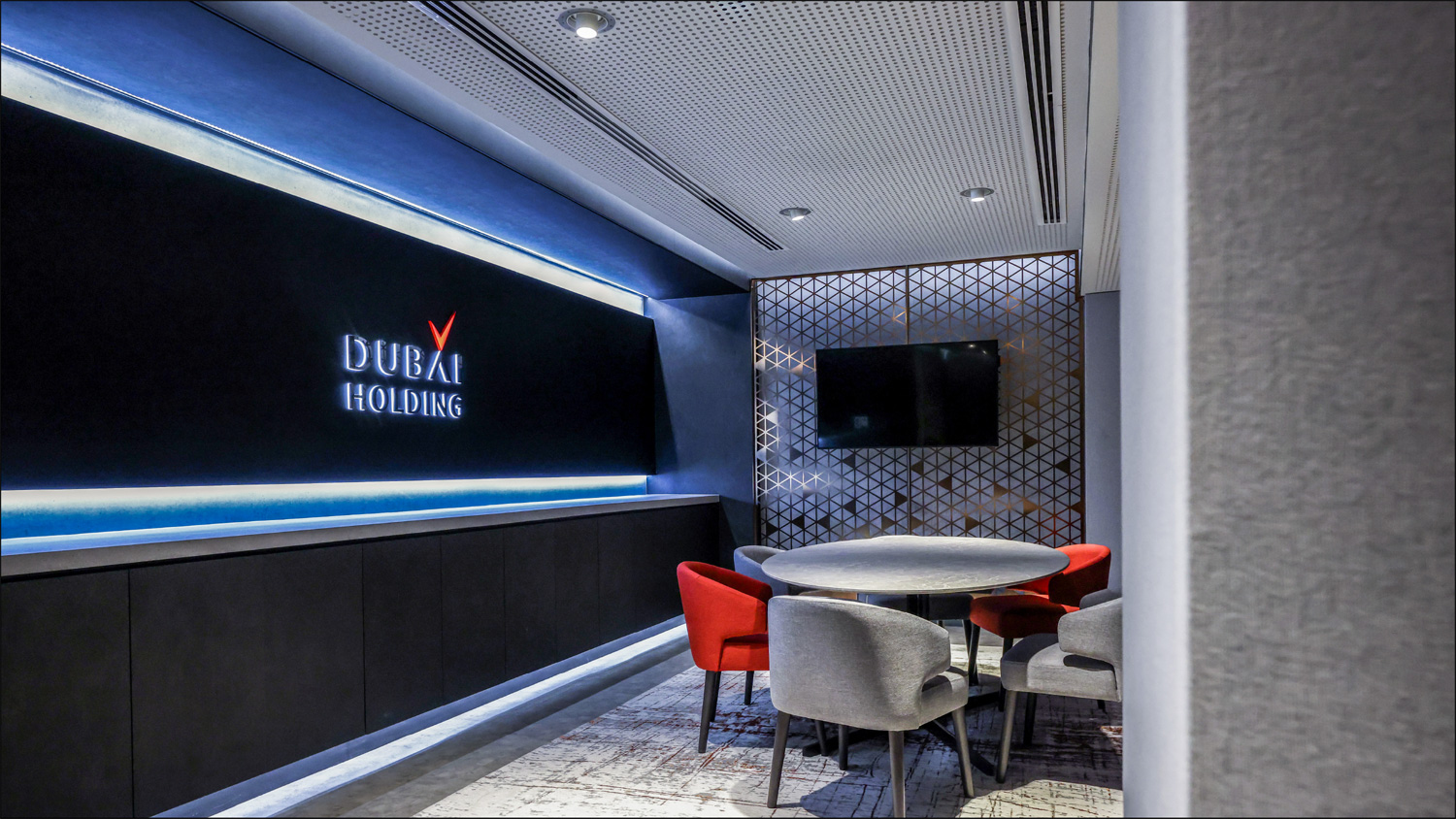 Dubai Holding suite bar and illuminated branding