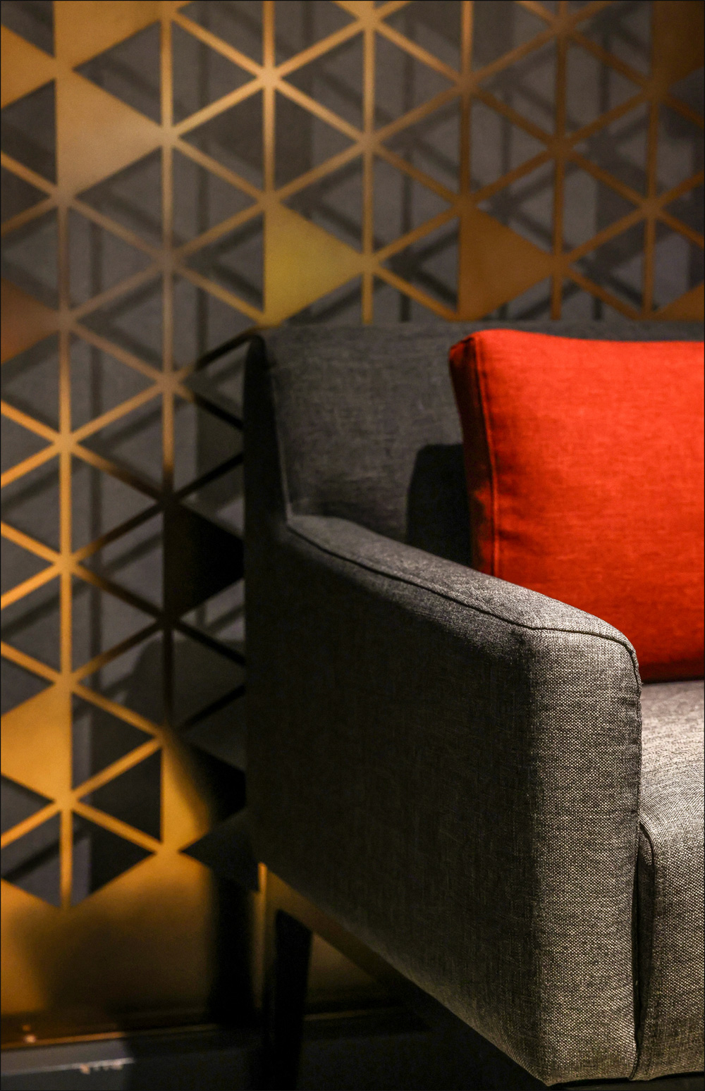 Red cushion and patterned metal screen