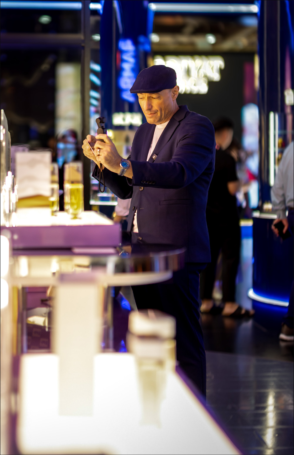 Visitor trying fragrance at the ARMAF stand