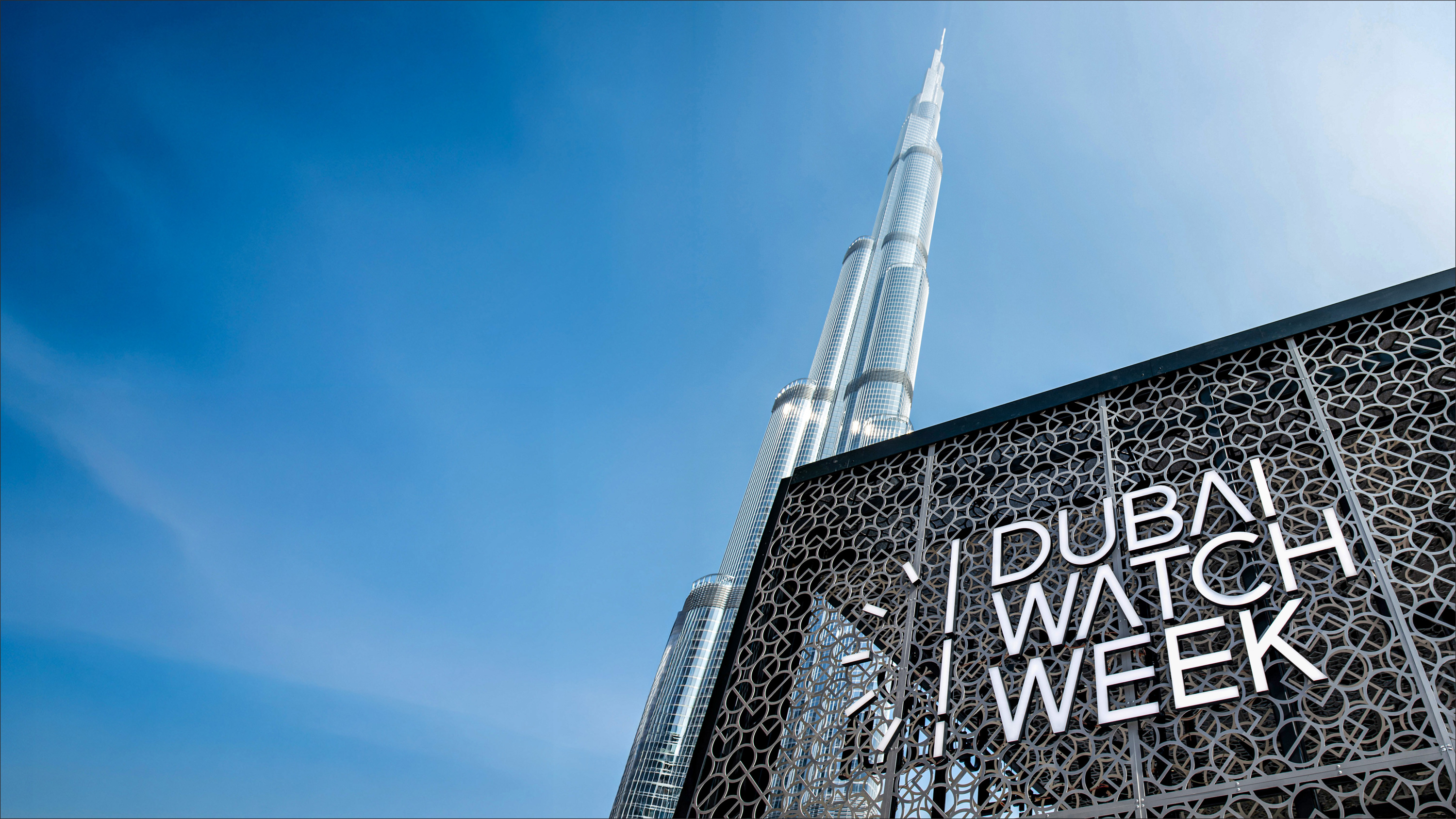 Dubai Watch Week 2025 — entrance screen with Burj Khalifa above